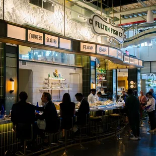 customers sitting at the counter