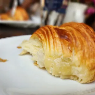 a croissant on a plate