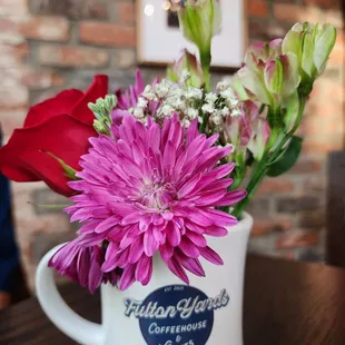 flowers in a mug