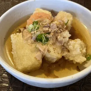 a bowl of food on a table