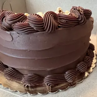 a chocolate cake with chocolate frosting