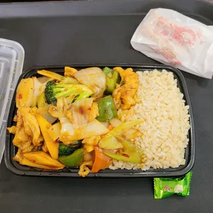 Mango chicken special with brown rice.  Delicious sauce underneath