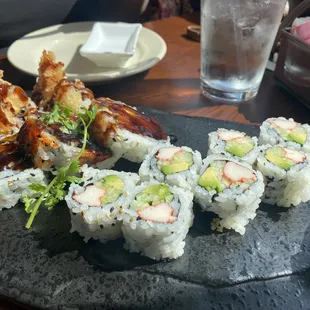 A California roll and a shrimp tempura roll.