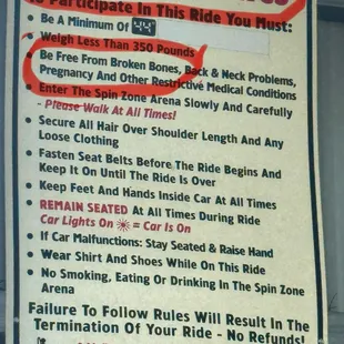 Spin Zone posted rules and warning.