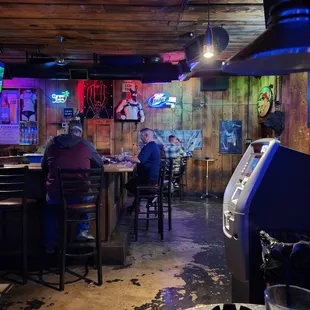 people sitting at the bar