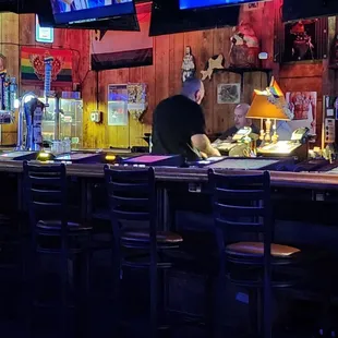 a man working at the bar