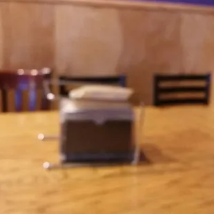 a wooden table and chairs