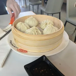 Steamed bao... or bomb-ass bao if you prefer