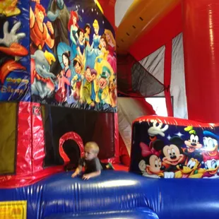 Disney themed obstacle course and small slide.