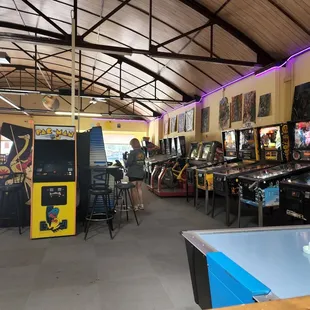 a row of pinball machines