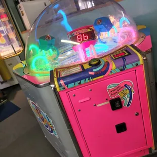 a pink arcade machine