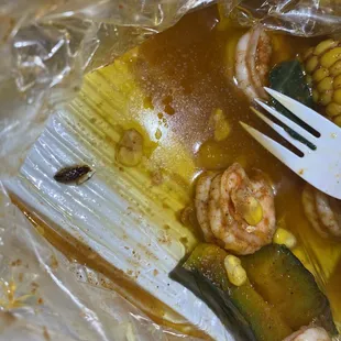 a fork stuck in a plastic bag