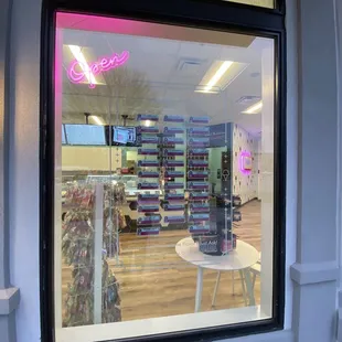 a view of a store through a window