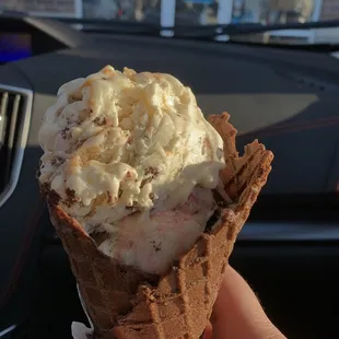 Chocolate cone -- 1 scoop Kitty Kitty Bang Bang, 1 scoop peanut butter cookie dough