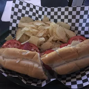 two hotdogs and chips