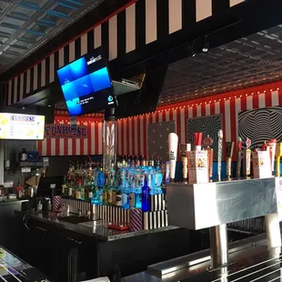 a view of a bar with a television