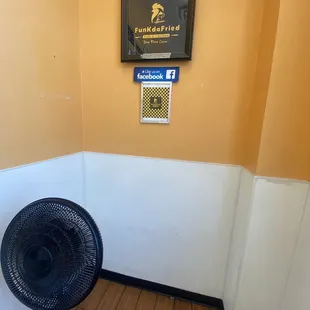 a fan in a corner