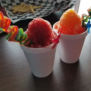 A cherry sour snowcone, and what we have loving dubbed the Fuzzy Monkey (peach and pineapple) with an airhead extreme for zing!