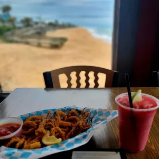 Inside view of the beach. Strawberry daiquiri and calamari appetizer