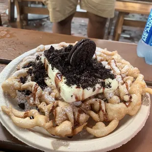 a plate of waffles with oreo cookies on top
