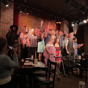 a group of people on stage