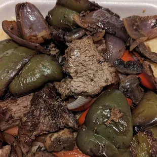 meat and vegetables in a styrofoam container
