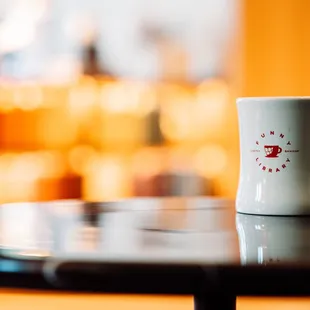 a coffee cup on a table