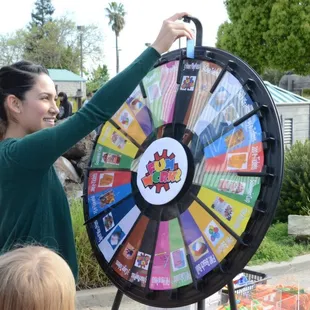 Spinning the Prize Wheel at the Funworks Easter Egg Hunt