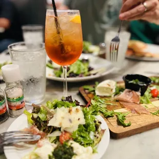 Appetizers: Pear salad (amazing) and buffalo + burrata plate w/ bread. Cocktail: Aperol Spritz