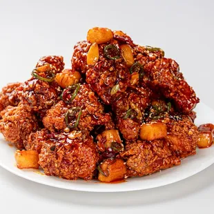 Kang Jung: Fried Chicken braised in our Spicy Korean Chili Paste Kang Jung sauce with chilis, rice cakes, &amp; toasted nuts.