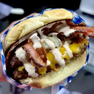 The Furley Fire burger - double patty, Cheddar, pepper jack cheese, peppered bacon and house sauce