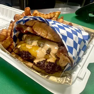 "The Furley fire burger combo" comes with fries and coke.