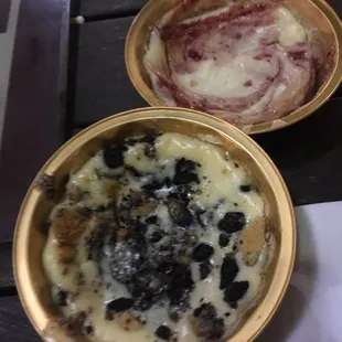 two bowls of food on a table