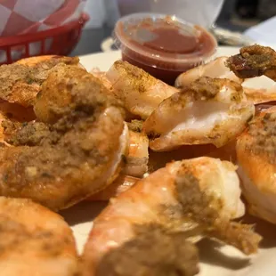Steam shrimp with seasoning and cocktail sauce.