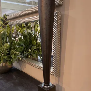 feet tall drinking vessel with holes...