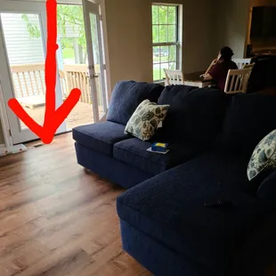 My new sectional that we custom ordered. Only missing an entire section. We only have to wait 6 more weeks to get the rest.