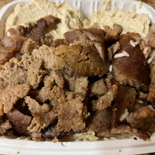 meat and rice in a styrofoam container