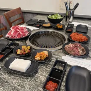 a table with a variety of food items