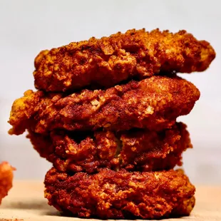 a stack of fried chicken nuggies