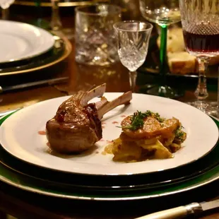 Lamb Chops served with blackberry jalapeño glaze &amp; porcini potatoes.