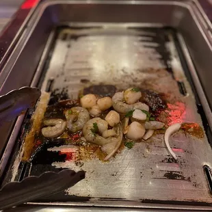 Shrimp and scallops on the bbq. It took a long time to cook.