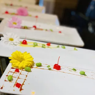 a row of plates with food on them