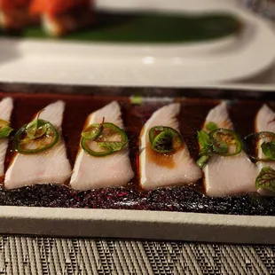 Yellowtail with Jalapeno.  Be sure to pour the sauce over before eating.