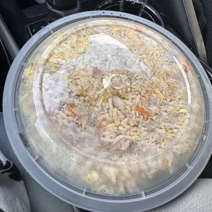 a tray of food in the passenger seat of a car