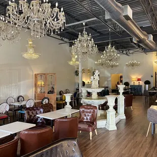 a dining room with chandeliers