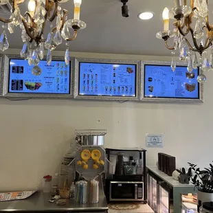 a coffee shop with a chandelier