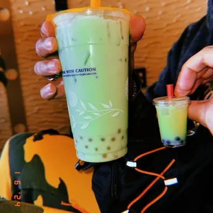 Honeydew cream tea w/ passion fruit popping boba