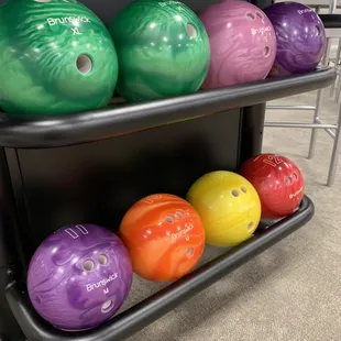 a rack of bowling balls