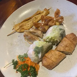 Appetizer combo with a few bites missing