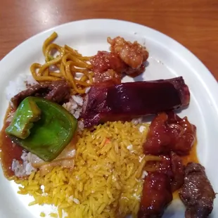 a plate of food on a wooden table